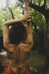 woman connecting to mother earth and her feminine energy