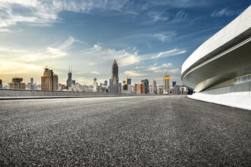 Empty asphalt road and cityscape with skyline in modern city in Shanghai