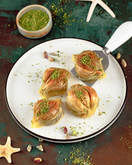 Turkish baklava with pistachios served on a plate