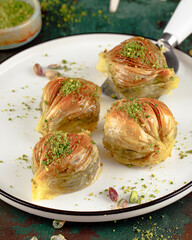 Turkish baklava with pistachios served on a plate