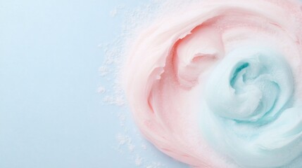 Fototapeta premium Swirls of pastel cotton candy afloat on a light blue background evoking a playful carnival atmosphere