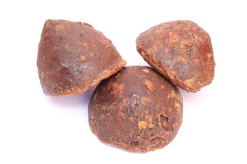 Palm jaggery isolated in a white background, south indian tamil nadu sweet made from palm jaggery