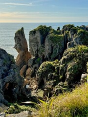Closeup of unique rock formation, rugged limestone layers Punakaiki Pancake Rocks scenic lookout