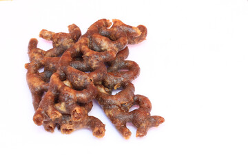 3 pieces of palm jaggery candy isolated in the white background, a south indian sweet 
