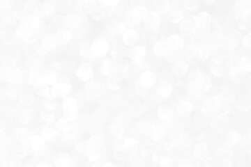 White and gray bokeh background. Photo can be used for the concepts of New Year, Christmas, Wedding Anniversary and all celebrations.