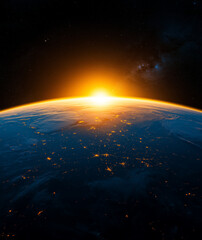 Obraz premium breathtaking view of Earth from space, showcasing vibrant sunrise over horizon, illuminating planet surface with city lights. vastness of space and distant stars create stunning backdrop