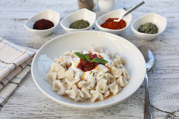 Mantı - Turkish ravioli pasta on wood concept