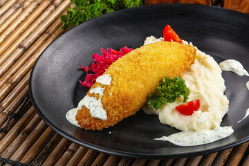 Chicken Kiev cutlet with puree