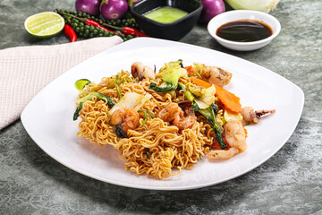 Asian cuisine - Fried noodles with seafood