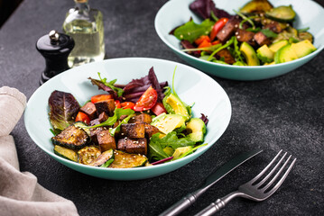 Healthy vegan keto salad with tofu and avocado