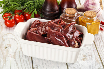 Raw chicken liver uncooked in the bowl