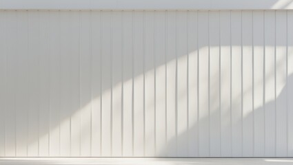 Sunlit White Wall with Vertical Paneling and Subtle Shadow Play