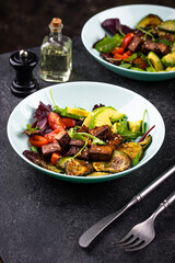 Healthy vegan keto salad with tofu and avocado
