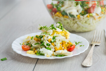 Chinese cabbage salad with squid, eggs, tomatoes and other vegetables