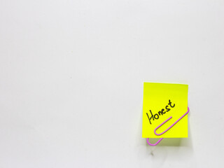Sticky note with positive words written on a white background. Motivational word photo concept....