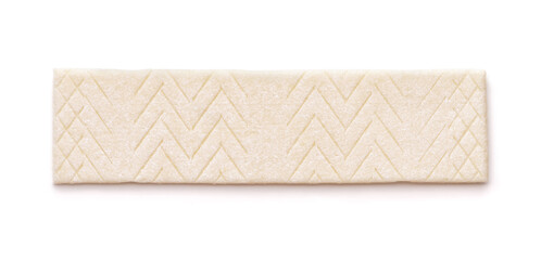 Top view of unwrapped sugar free chewing gum stick