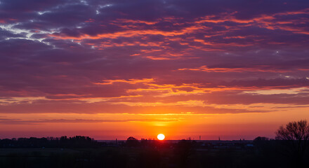 Obraz premium Camera Capturing a Vibrant Sunset