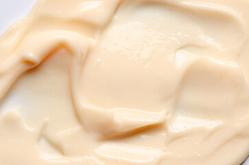 The texture of a cosmetic cream or balm