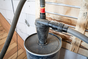 Cyclone dust collection system connected to a vacuum cleaner. System for extracting sawdust when...