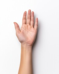 Obraz premium An open human hand against a white background, displaying a gesture of openness and simplicity.