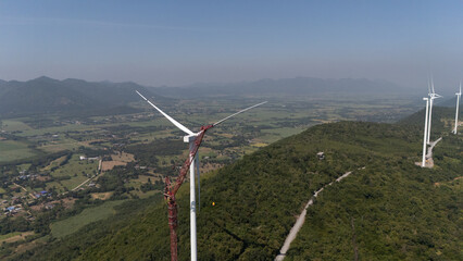 Wind turbines generate electricity at sunset in Europe and Asia