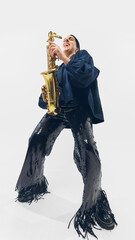 Expressive female saxophonist in sequined pants bending into dynamic pose, deeply feeling melody,...
