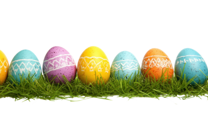 Colorful Easter eggs displayed on green grass for spring celebration on a transparent background, cut out