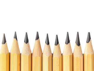 Assorted sharpened pencils arranged neatly on a white background