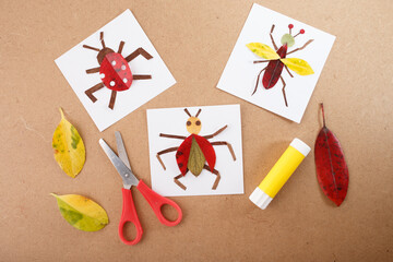 Nature inspired DIY craft project featuring insect designs made from leaves, arranged on a creative...