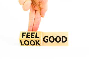 Look and feel good symbol. Concept words Look good Feel good on wooden cubes. Beautiful white table white background. Doctor hand. Healthy lifestyle look and feel good concept. Copy space.