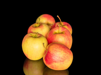 Ripe juicy apples isolated on black background, macro.
