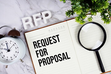 RFP - Request For Proposal acronym on notepad, Business concept background