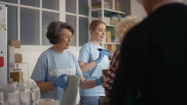 POV of a person in need standing in a queue at a soup kitchen, receiving aid
