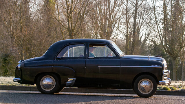 Stony Stratford,UK - Mar. 2nd 2025:  1954 Vauxhall Velox classic car driving on a British road.