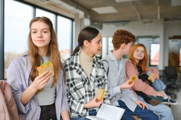 group of young college students in classroom