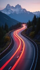 Scenic Mountain Road at Dusk with Car Light Trails - Asphalt Highway in Alpine Landscape