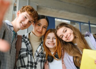 group of young college students in classroom