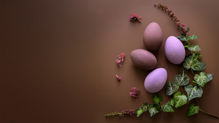 Easter greeting card in a minimalist style with floral ornament and warm chocolate tones