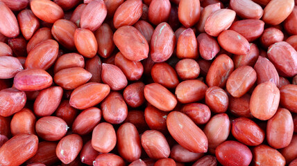 Full screen of peeled peanuts texture