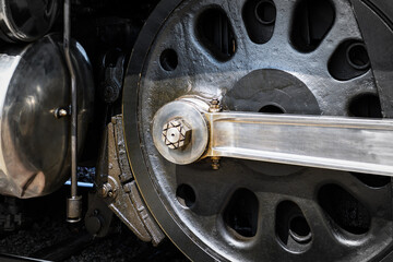 Extreme Close Up of One Wheel of Vintage Steam Engine