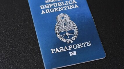 International biometric passport of a citizen of Argentina on the dark background
