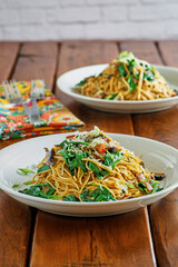 Asian style noodles with sautéed spinach and mushrooms