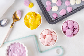Frozen yogurt melts, mixed berry yoghurt drops, kids-friendly sweet healthy snack, quick baby food snack, tasty ice cream bites, copy space