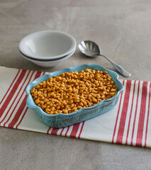Boston style baked beans in a serving dish