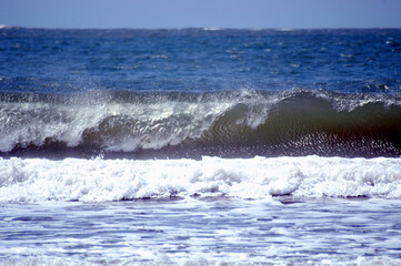 Beautiful wave breaking on the shoreline on the beach in Malindi, Kenya