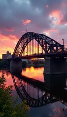Naklejka premium Stone Arch Bridge, Minneapolis skyline, sunset hues, cityscape, architecture