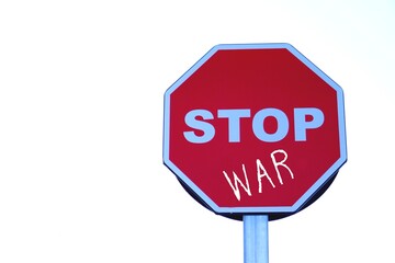 STOP WAR. road sign with the written words demanding the end of wars.
