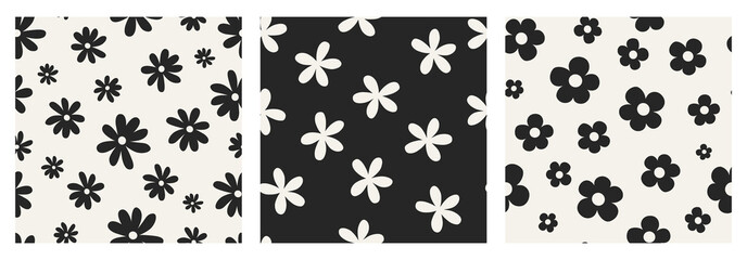 Seamless daisy patterns set. Black and white floral prints.