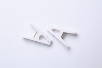 Plastic clothespins on a white background