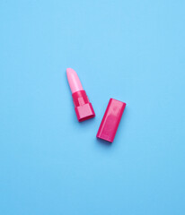 Doll lipstick on a blue background